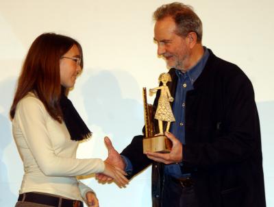 Edgar Reitz receiving the Castello d'Onore Award